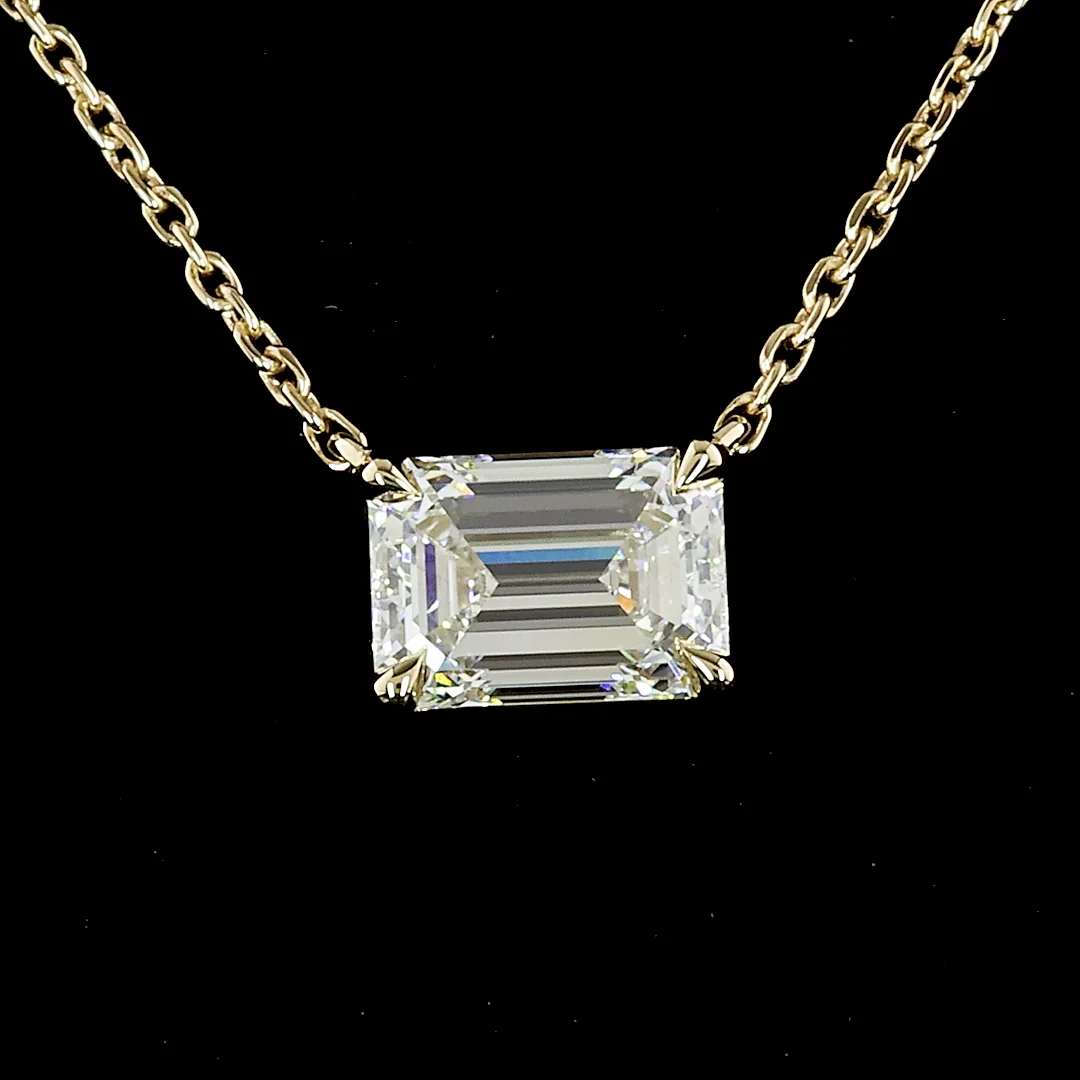1.06 Cts 14k Yellow Gold Emerald Shape Solitaire Pendant - Video