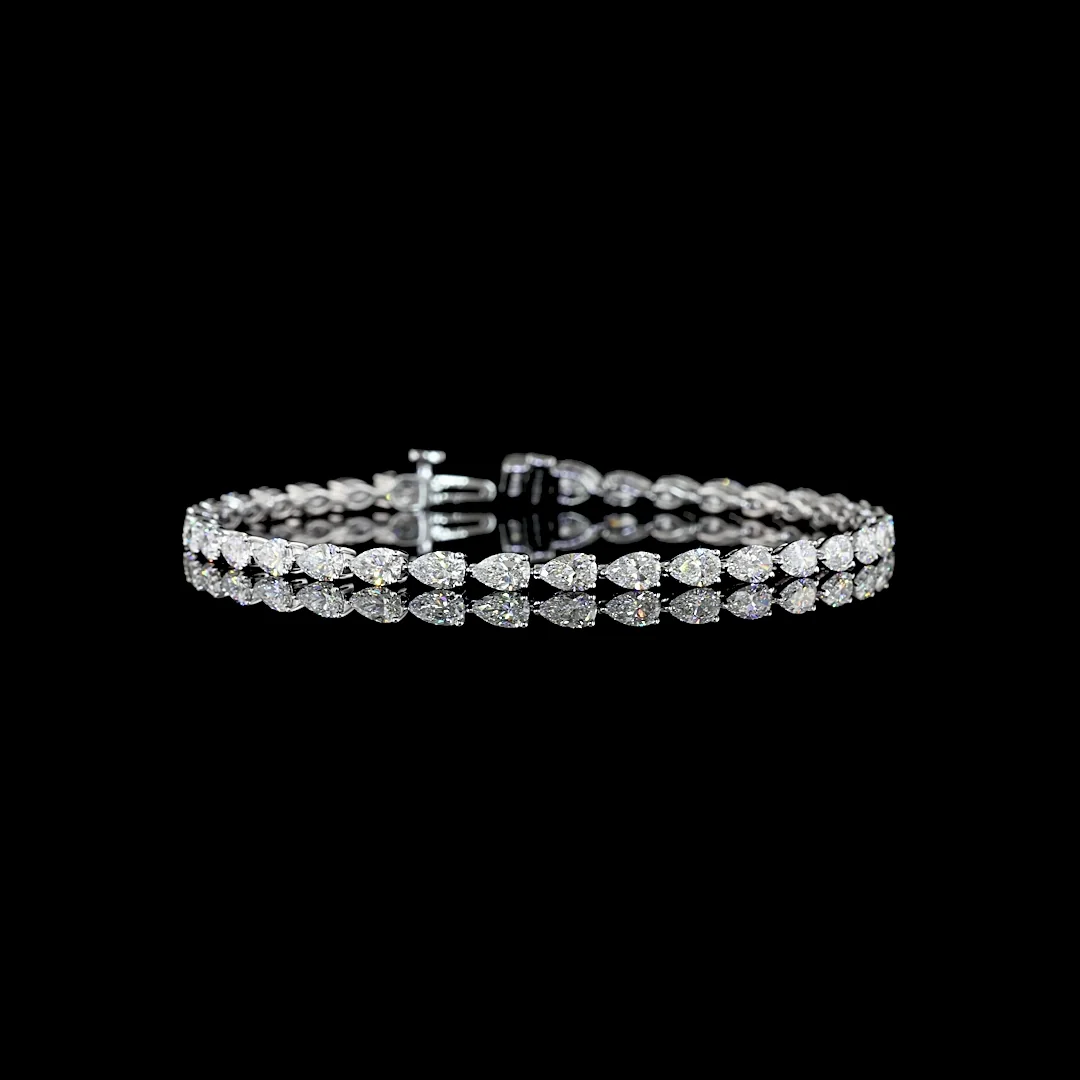 6.1 Cts 14k White Gold Pear Shape Tennis Bracelet - Video