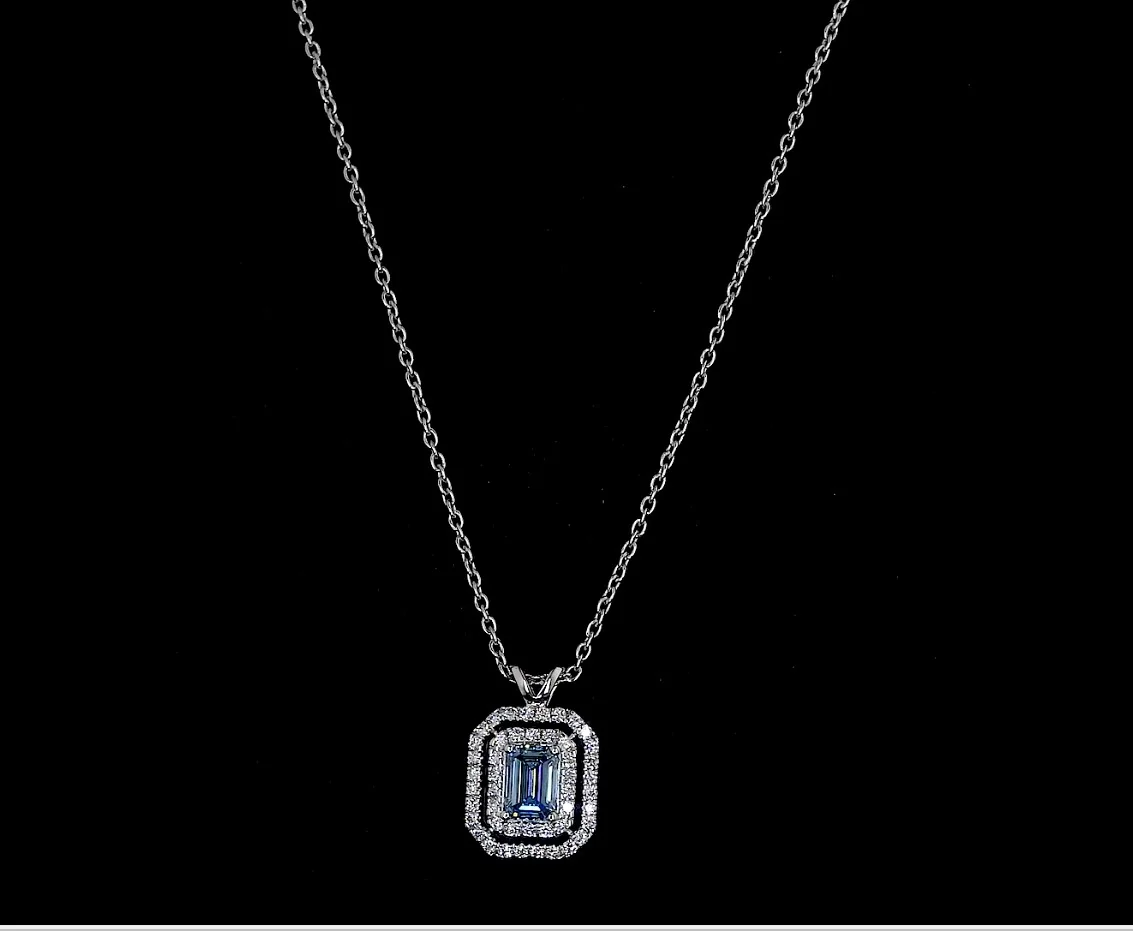 0.74 Cts 14k White Gold Emerald Shape Double Halo Pendant