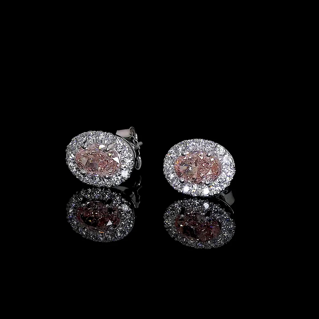 0.86 Cts 14k White Gold Oval Shape Halo Studs Earring