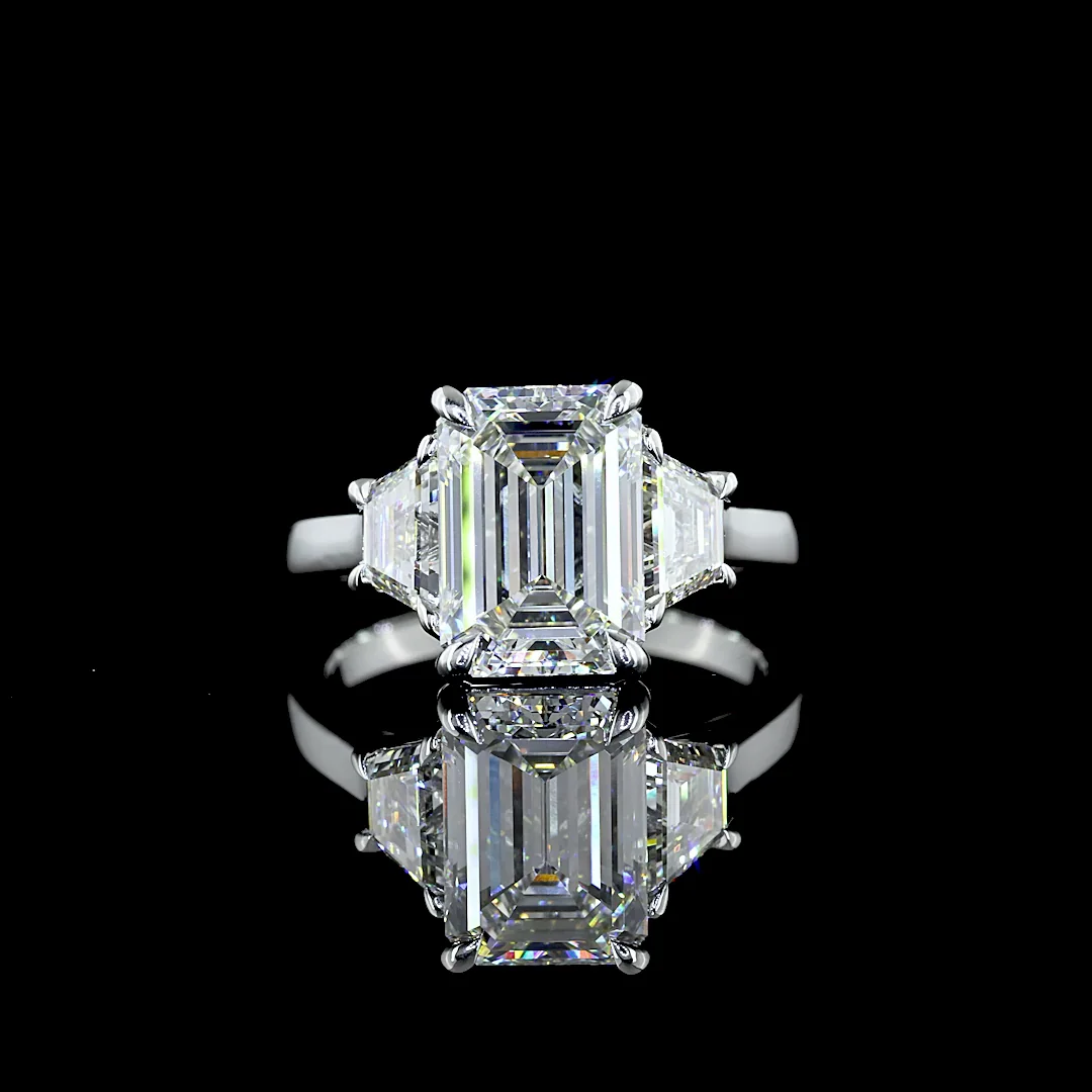 3.96 Cts Platinum Emerald Shape 3 Stones Ring